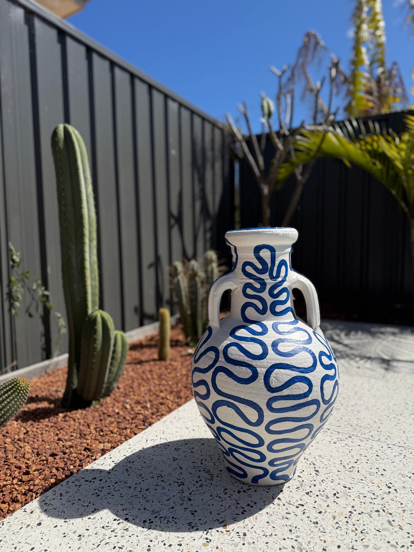 Squiggle Pot #1 – Original Acrylic on Clay Pot, 60cm High, Featuring Abstract Blue and White Squiggle Pattern.